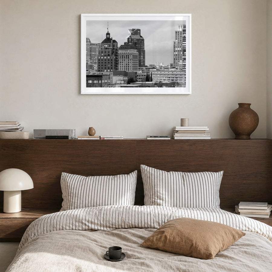 Sacramento Photo Poster in a white wood frame, hanging in a bedroom, white border