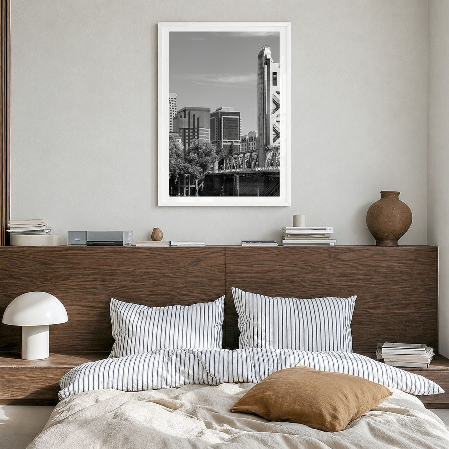 Sacramento Photo Poster in a white wood frame, hanging in a bedroom, white border