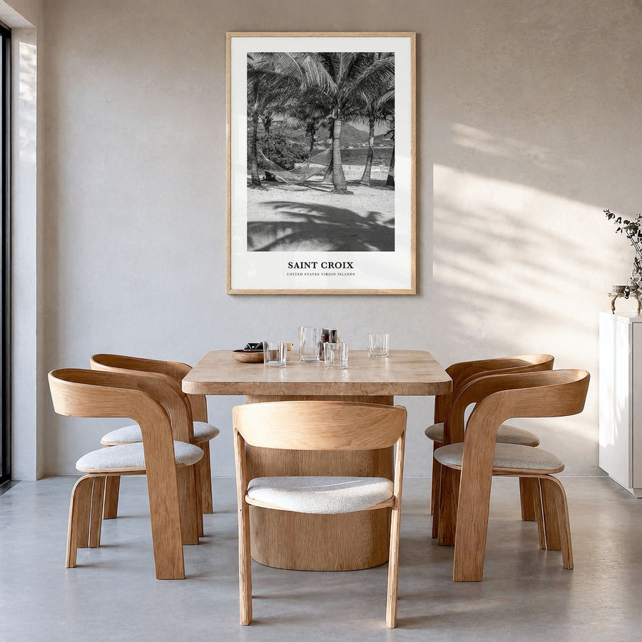 Saint Croix Classic Poster in a natural wood frame, hanging in a dining room