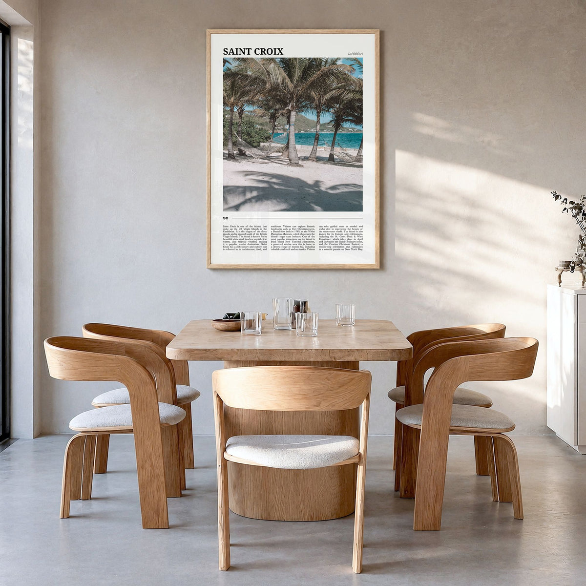 Saint Croix Travel Poster in a natural wood frame, hanging in a dining room
