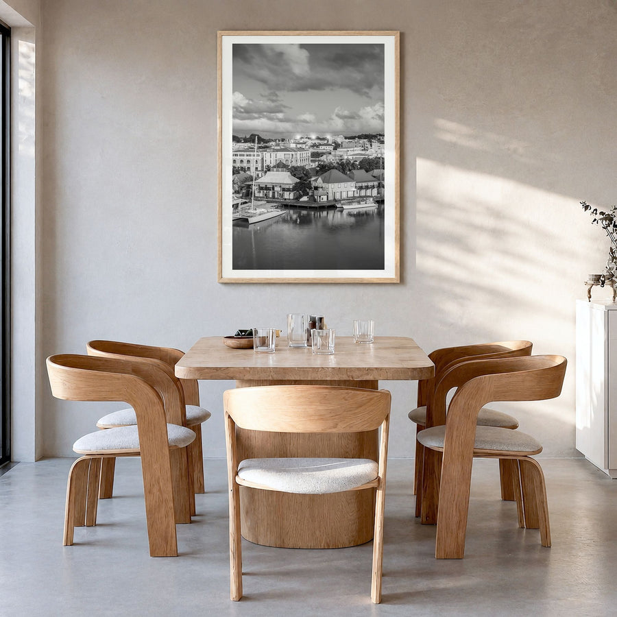 Saint John Photo Poster in a natural wood frame, hanging in a dining room, white border