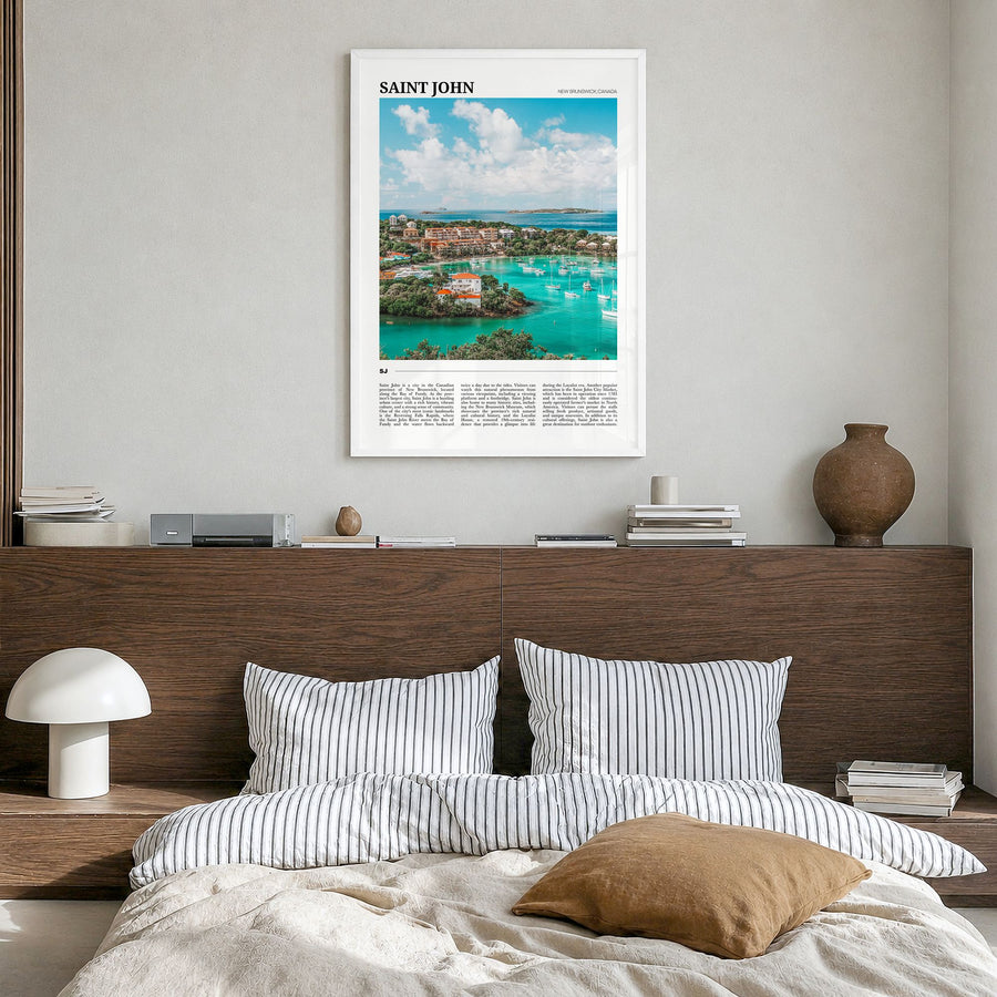 Saint John Travel Poster in a white wood frame, hanging in a bedroom
