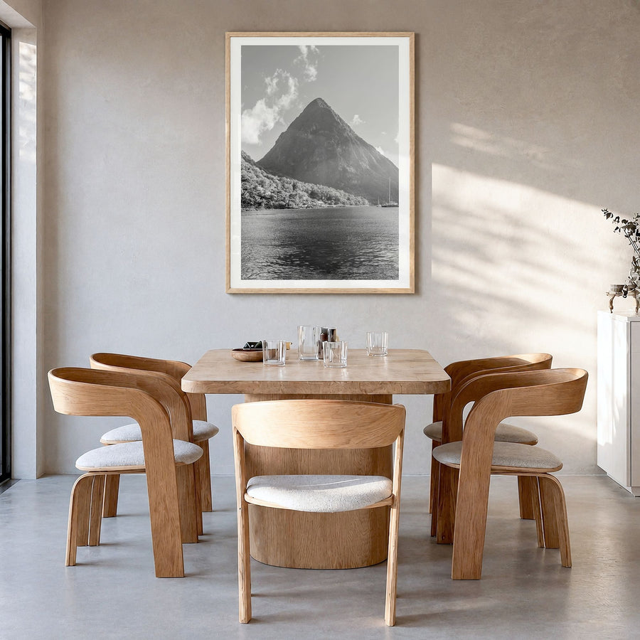 Saint Lucia Photo Poster in a natural wood frame, hanging in a dining room, white border