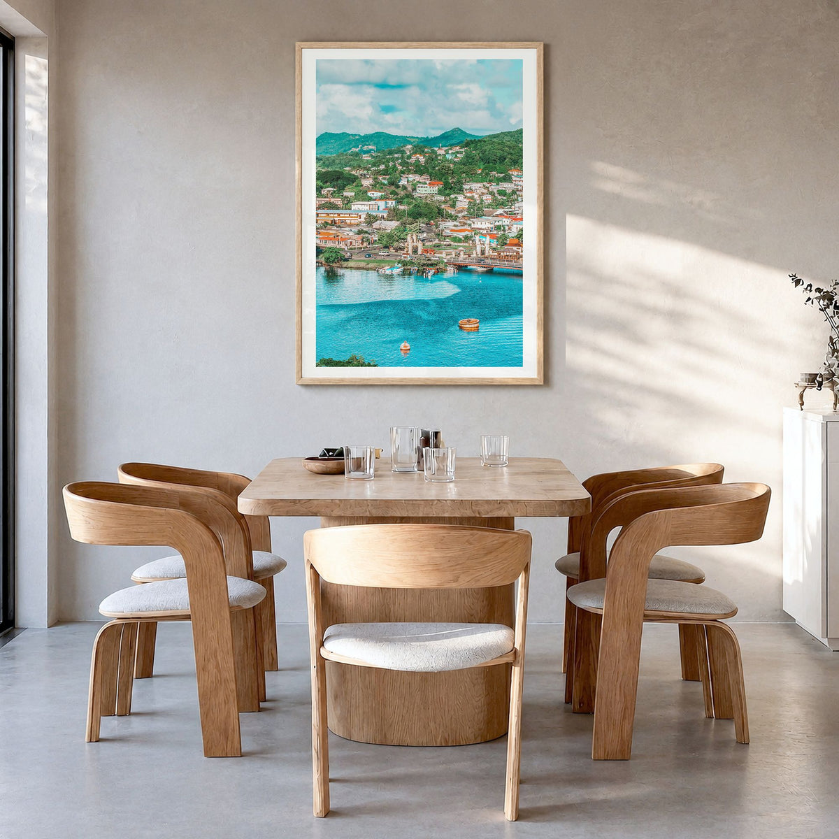 Saint Lucia Photo Poster in a natural wood frame, hanging in a dining room, white border