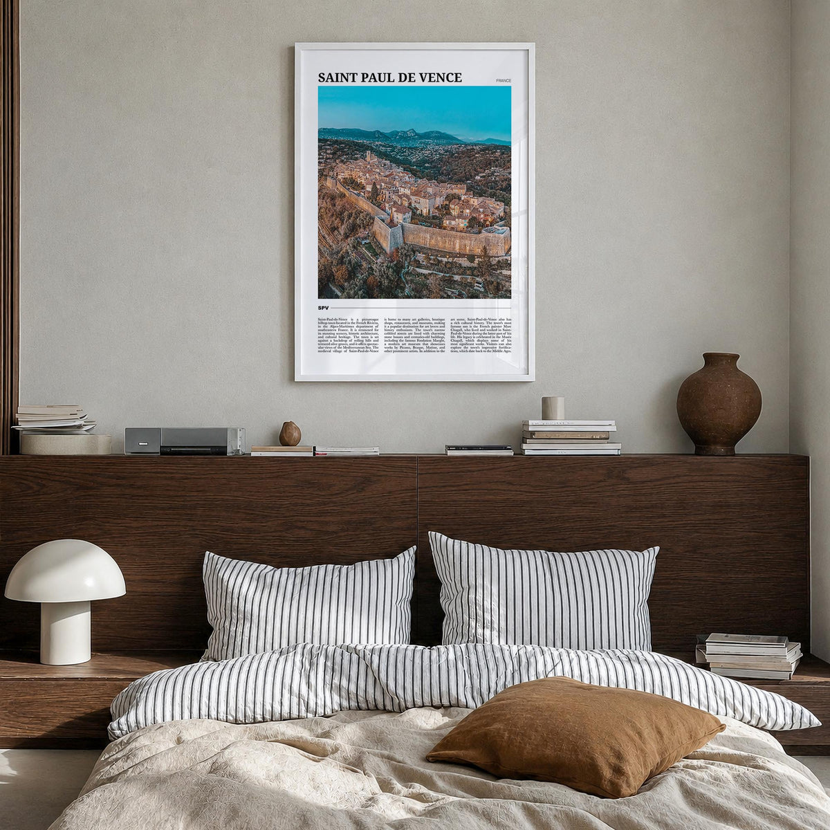 Saint-Paul-de-Vence colorful travel poster of France – vertical wall art in white wood frame, hanging on wall