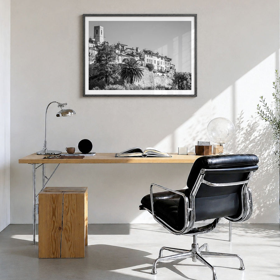 Saint Paul Photo Poster in a black wood frame, hanging in a bright home office, white border