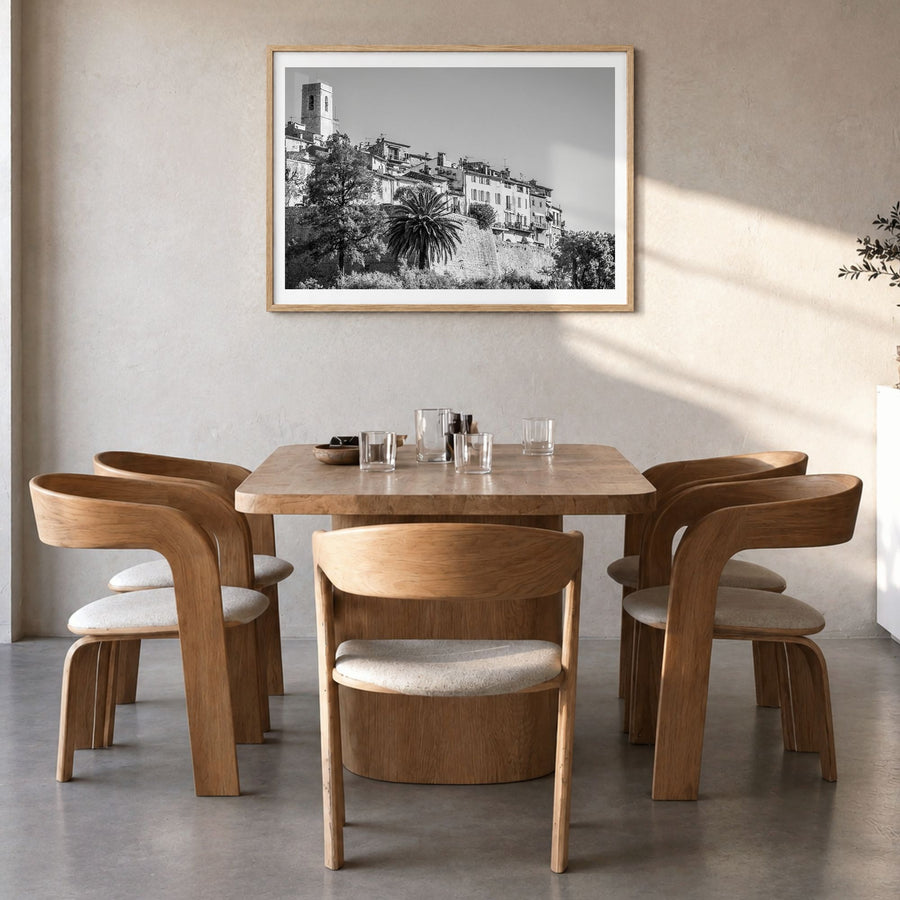 Saint Paul Photo Poster in a natural wood frame, hanging in a dining room, white border
