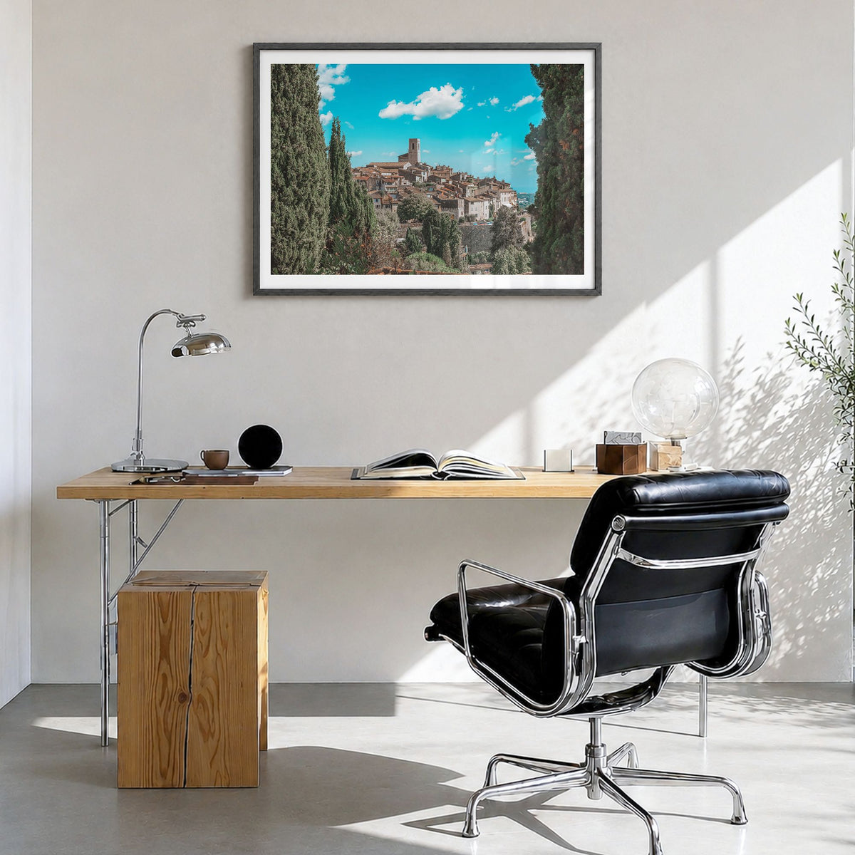 Saint Paul Photo Poster in a black wood frame, hanging in a bright home office, white border