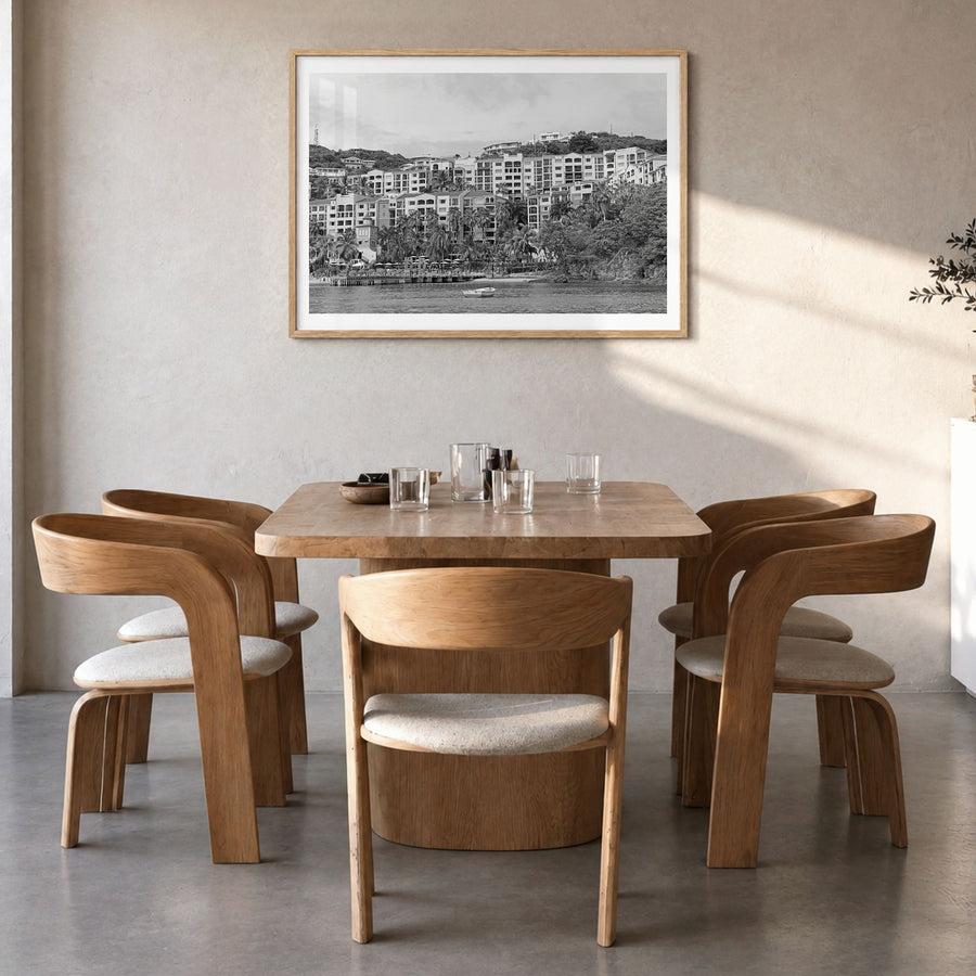 Saint Thomas Photo Poster in a natural wood frame, hanging in a dining room, white border