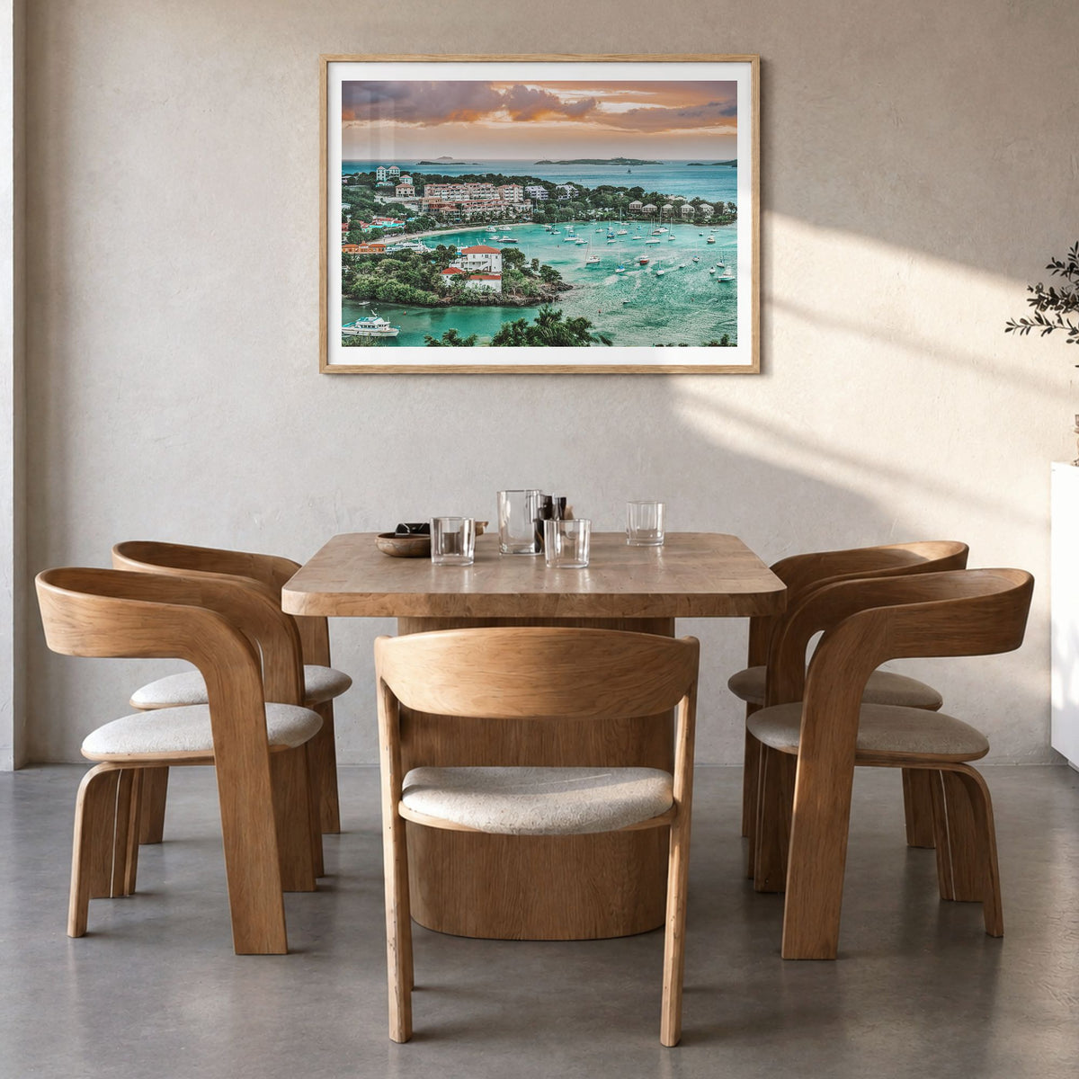 Saint Thomas Photo Poster in a natural wood frame, hanging in a dining room, white border