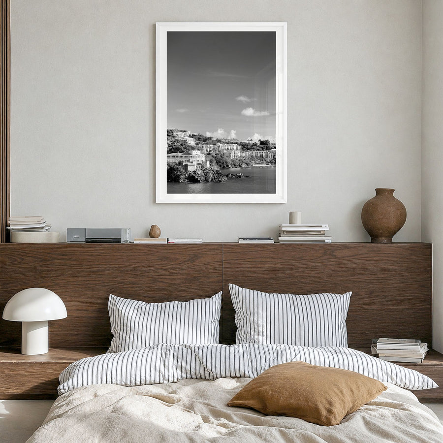 Saint Thomas Photo Poster in a white wood frame, hanging in a bedroom, white border