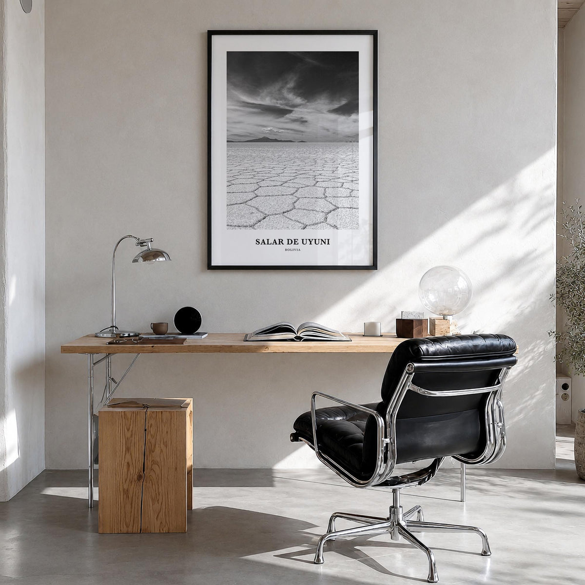 Salar de Uyuni black & white classic poster of Bolivia – vertical wall art in black wood frame, hanging on wall