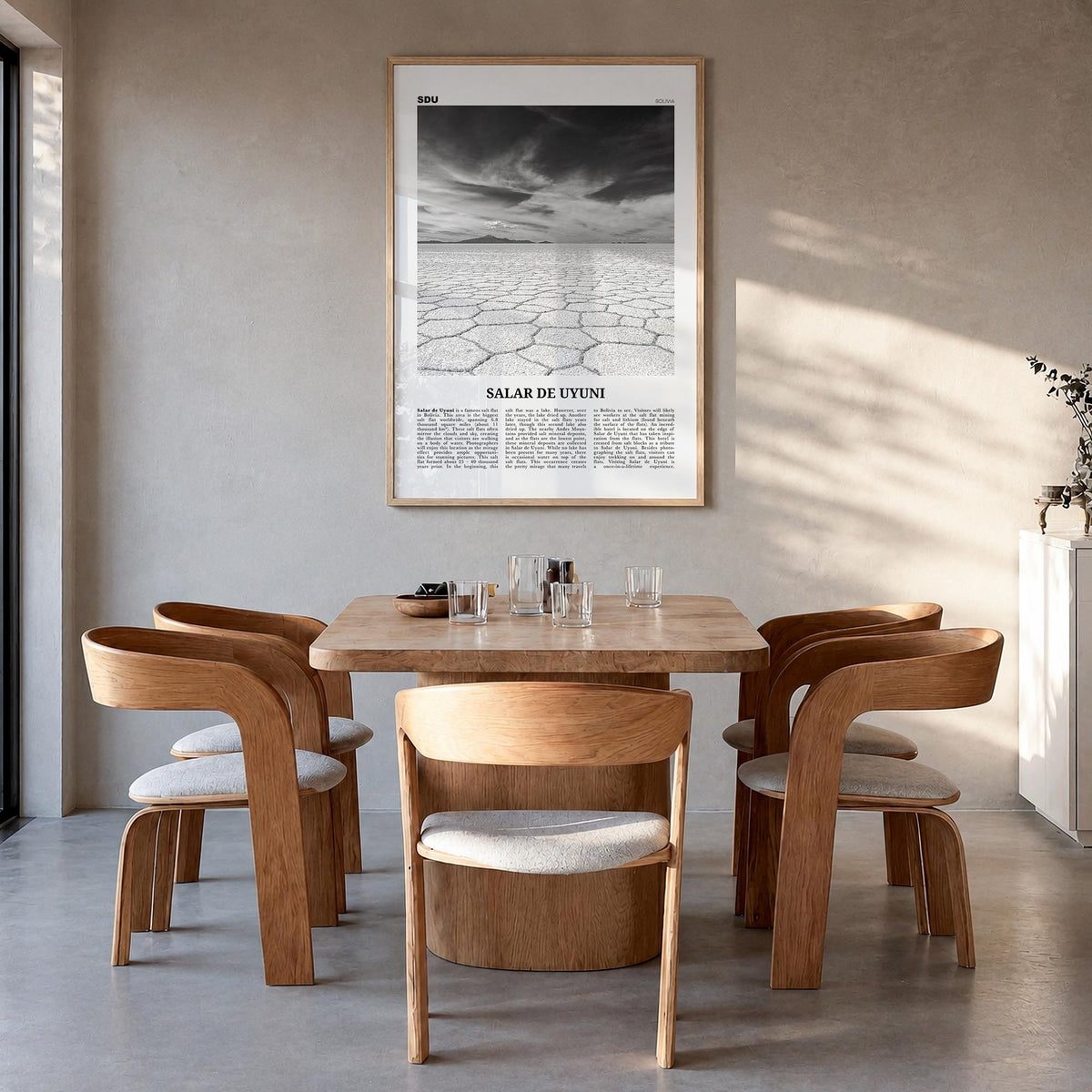 Salar de Uyuni black & white newspaper poster of Bolivia – vertical wall art in natural wood frame, hanging on wall