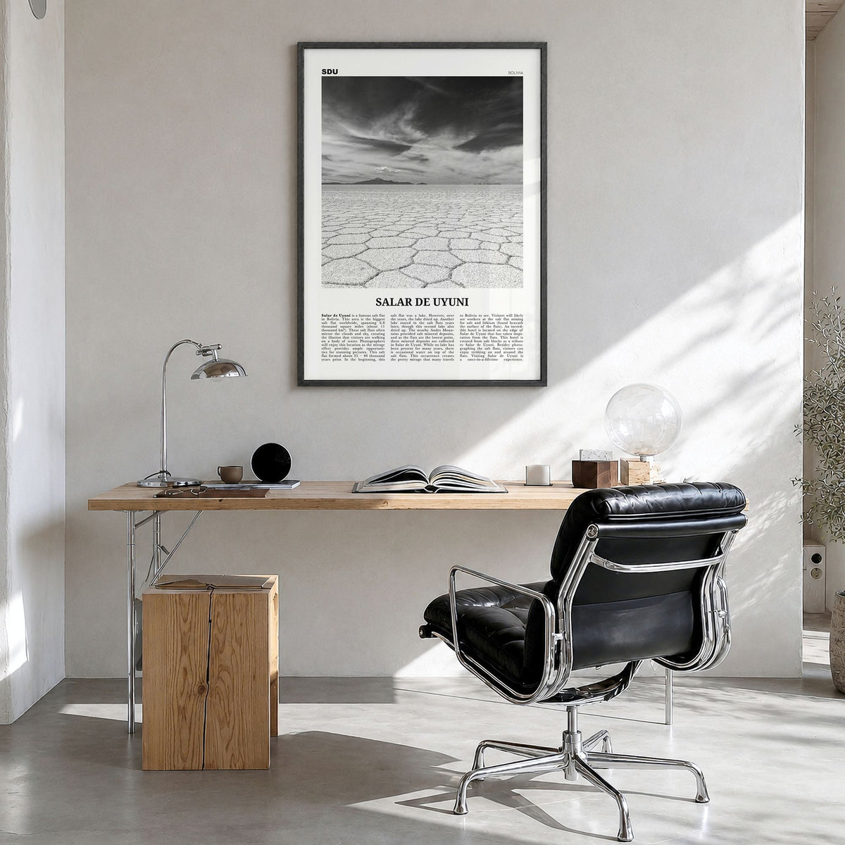 Salar de Uyuni Newspaper Poster in a black wood frame, hanging in a bright home office