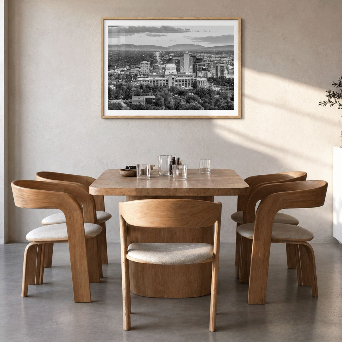 Salt Lake City Photo Poster in a natural wood frame, hanging in a dining room, white border