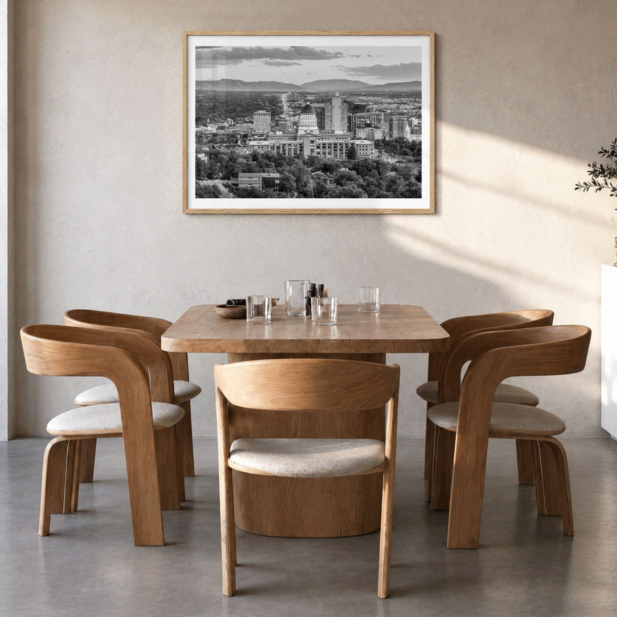 Salt Lake City Photo Poster in a natural wood frame, hanging in a dining room, white border