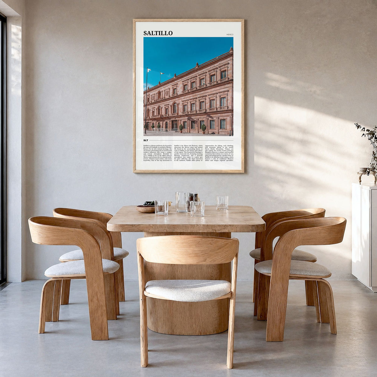 Saltillo Travel Poster in a natural wood frame, hanging in a dining room