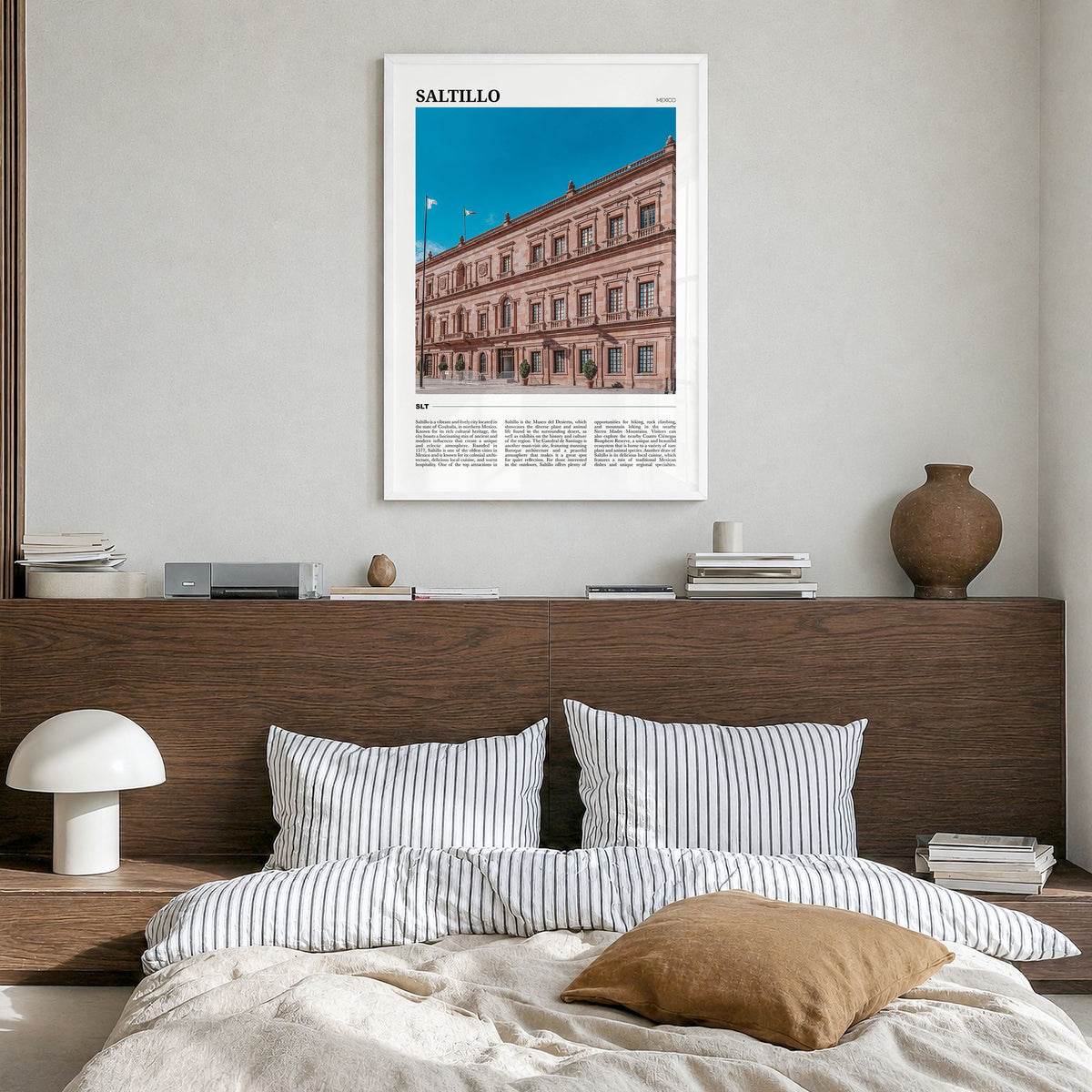 Saltillo Travel Poster in a white wood frame, hanging in a bedroom