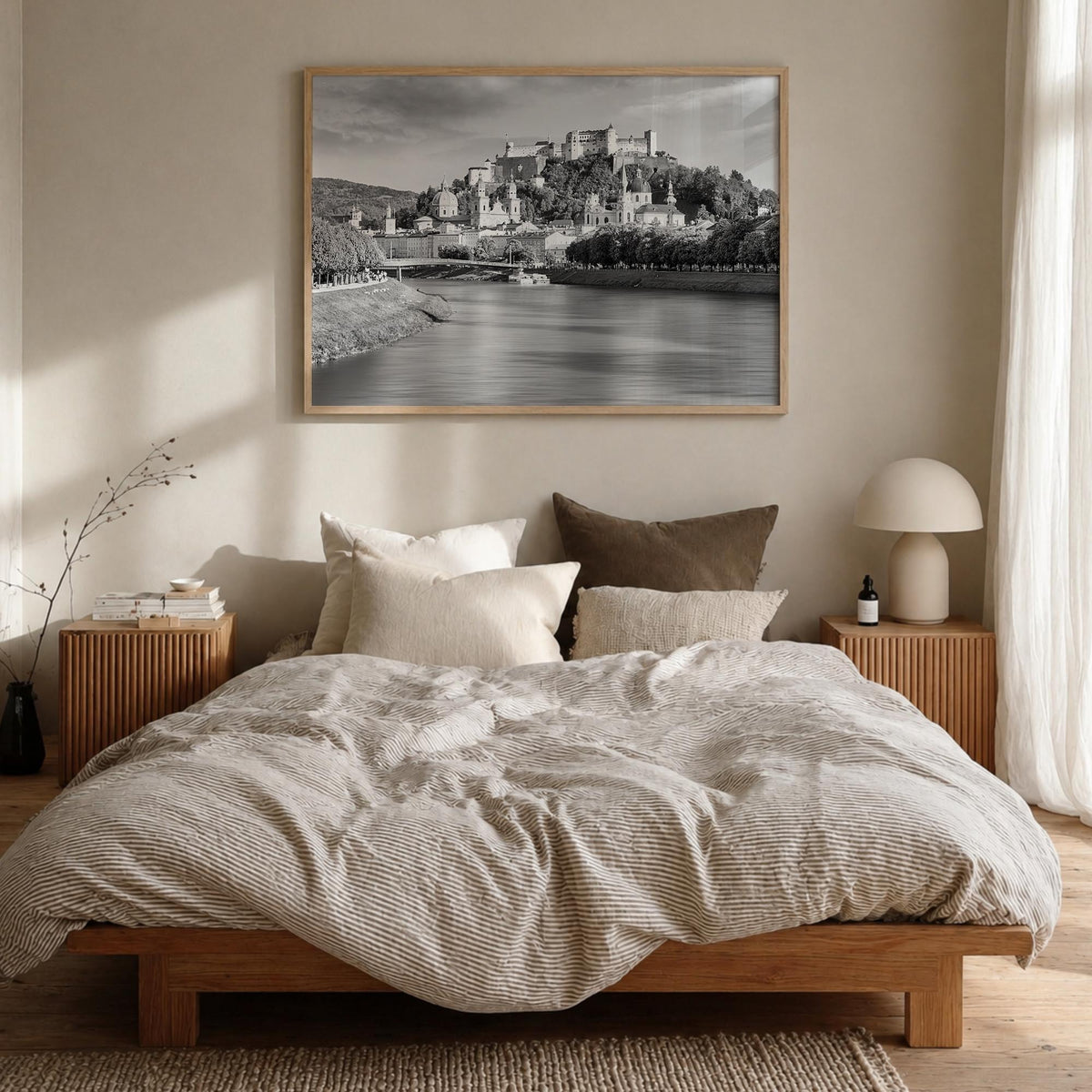 Salzburg black & white photo poster of Austria – horizontal wall art in natural wood frame, hanging on wall