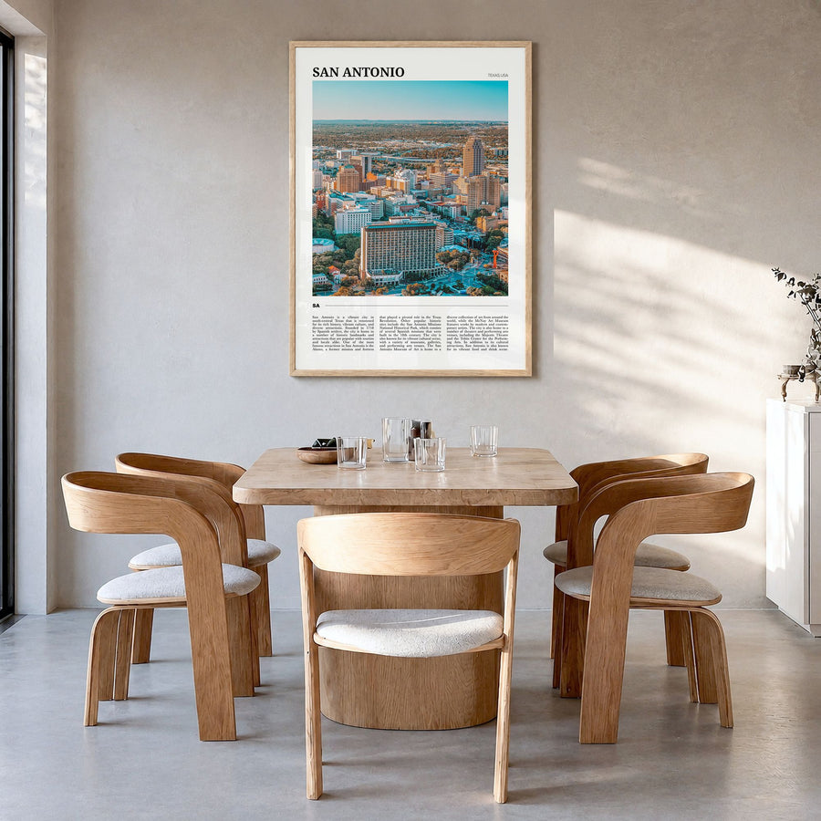 San Antonio Travel Poster in a natural wood frame, hanging in a dining room
