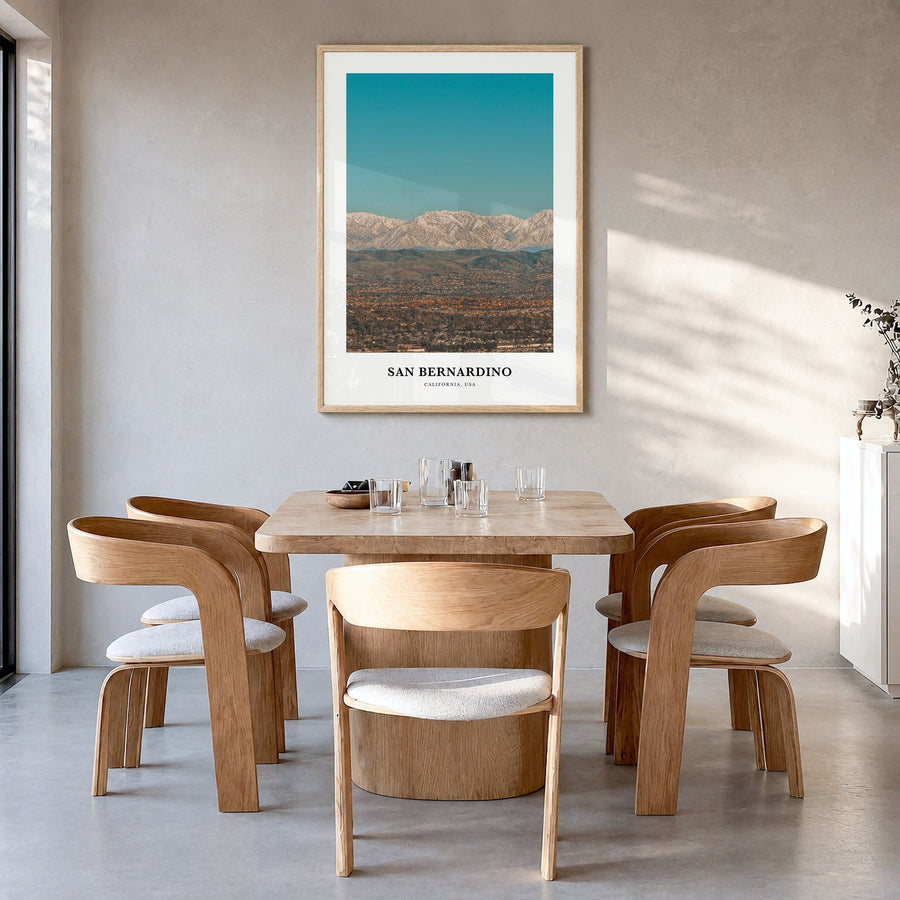 San Bernardino Classic Poster in a natural wood frame, hanging in a dining room