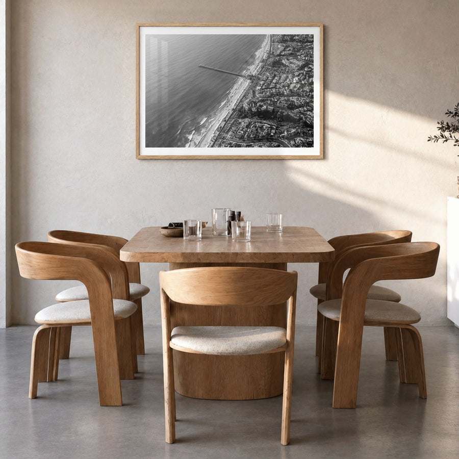 San Clemente Photo Poster in a natural wood frame, hanging in a dining room, white border