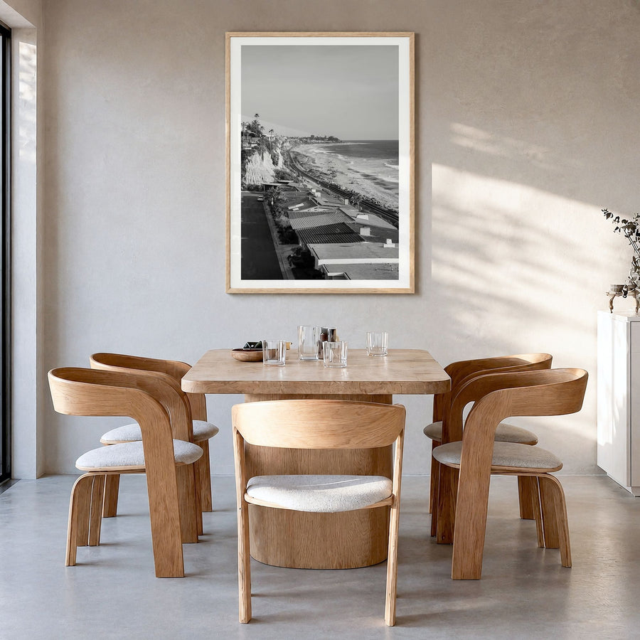 San Clemente Photo Poster in a natural wood frame, hanging in a dining room, white border