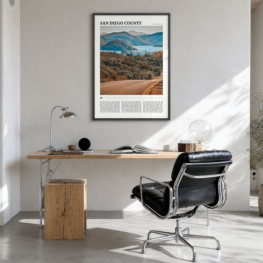 San Diego County Travel Poster in a black wood frame, hanging in a bright home office