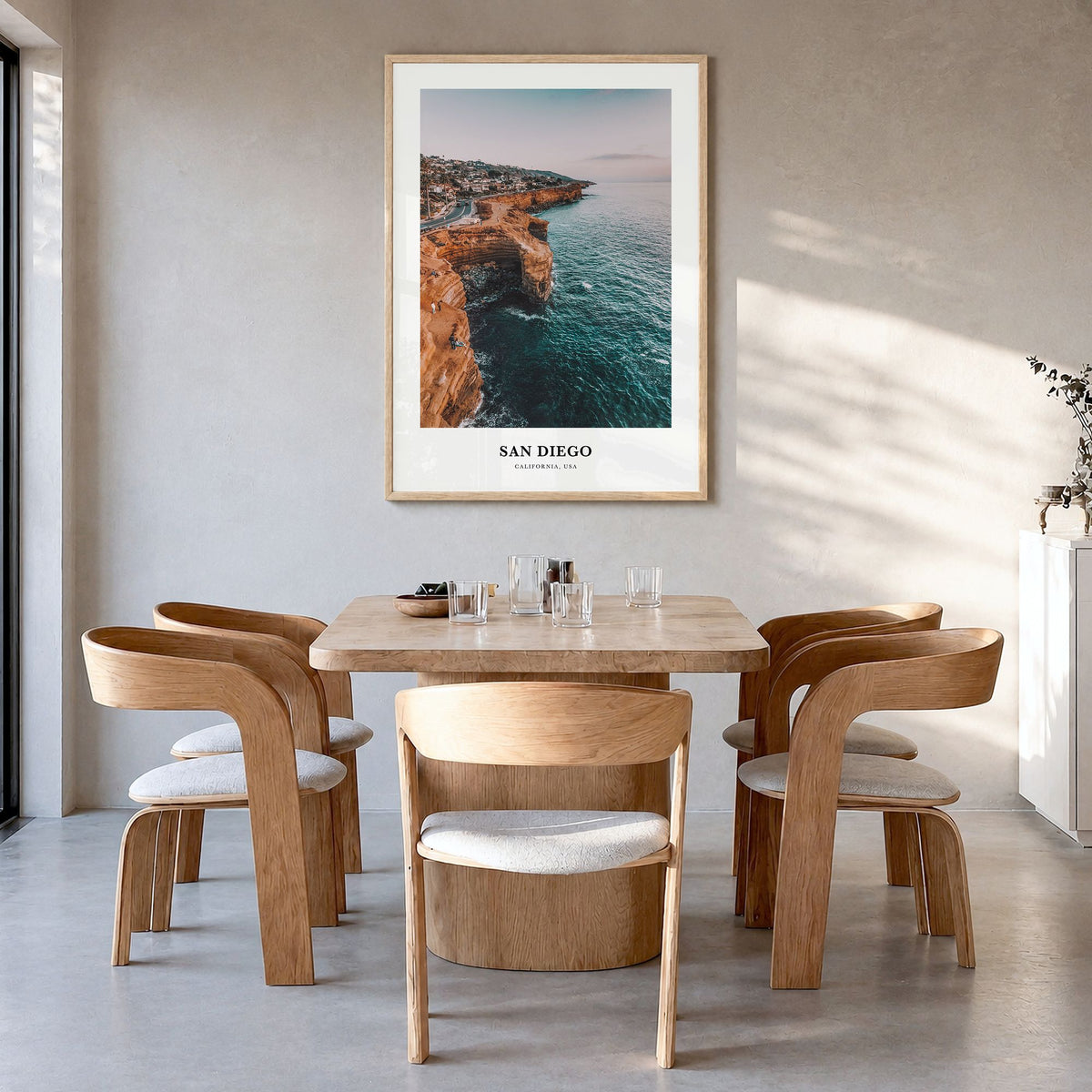 San Diego Classic No 1 Poster in a natural wood frame, hanging in a dining room