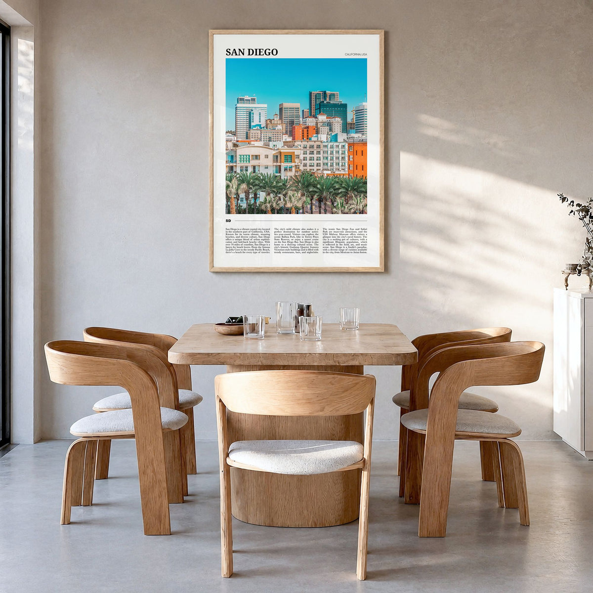 San Diego Travel No 2 Poster in a natural wood frame, hanging in a dining room