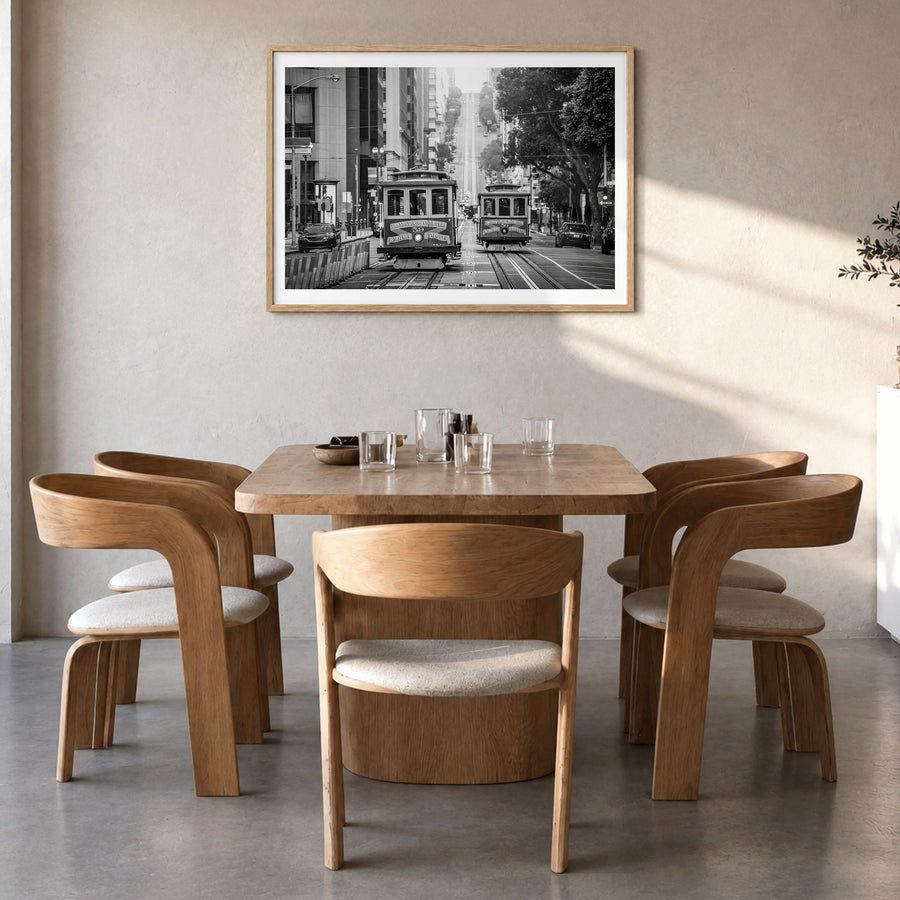 San Francisco Photo No 2 Poster in a natural wood frame, hanging in a dining room, white border