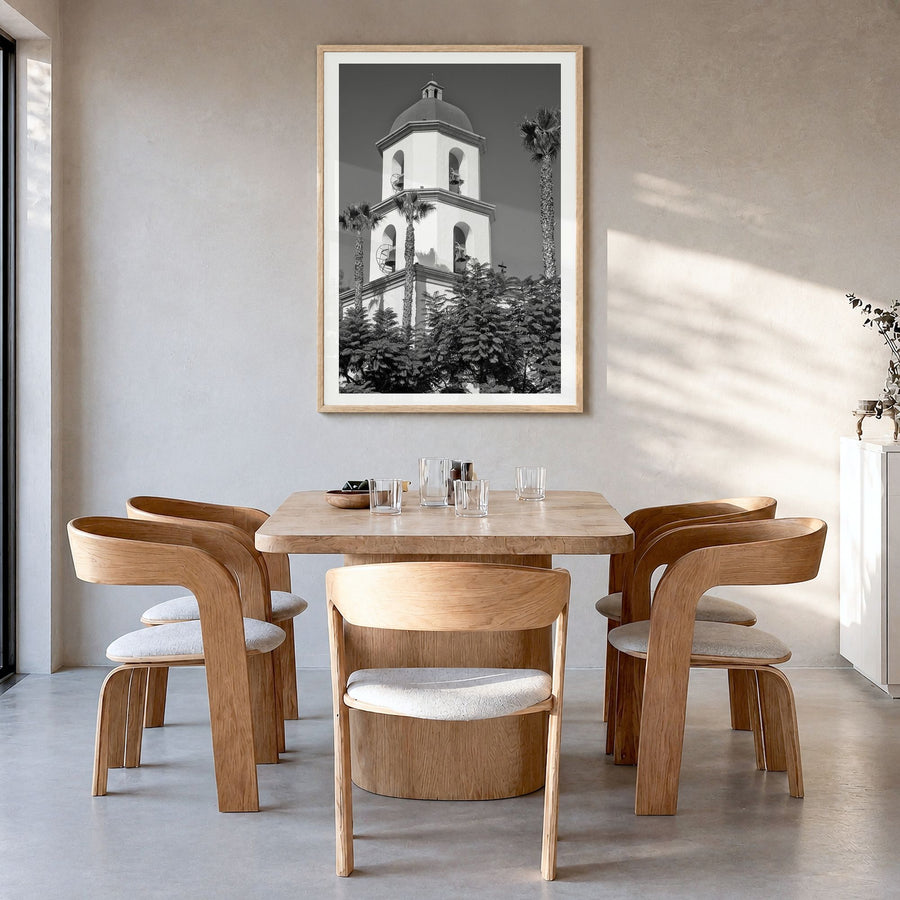 San Juan Capistrano Photo Poster in a natural wood frame, hanging in a dining room, white border