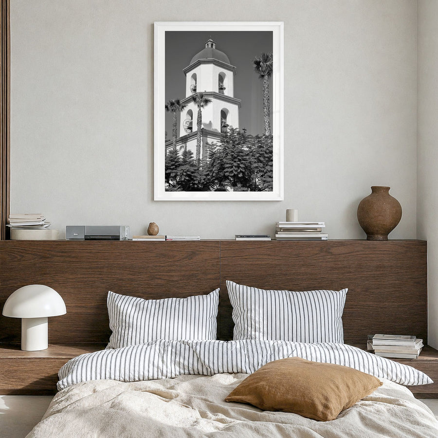 San Juan Capistrano Photo Poster in a white wood frame, hanging in a bedroom, white border