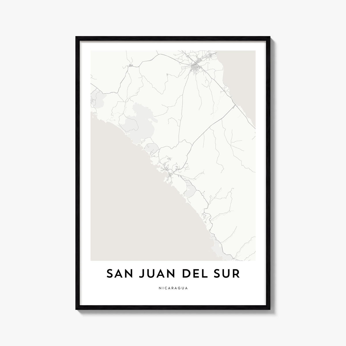 San Juan del Sur black & white map poster of Nicaragua – vertical wall art, unframed print shown in interior mockup