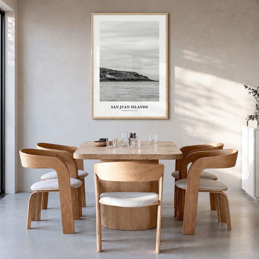 San Juan Islands Classic Poster in a natural wood frame, hanging in a dining room