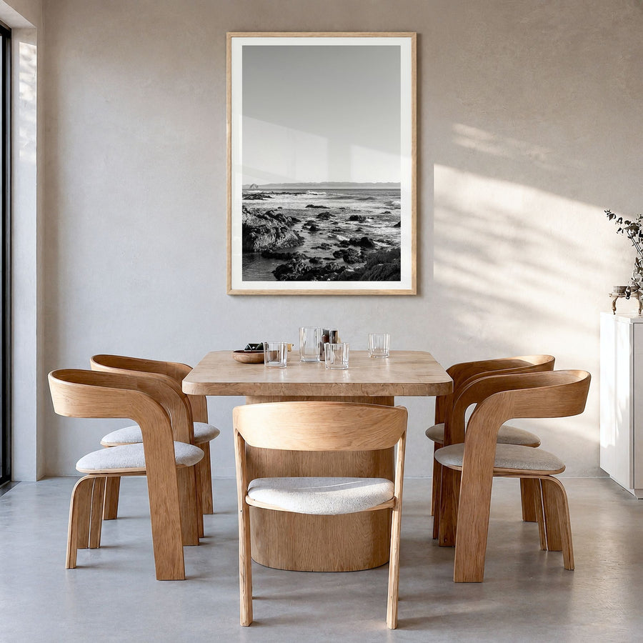 San Luis Obispo Photo Poster in a natural wood frame, hanging in a dining room, white border