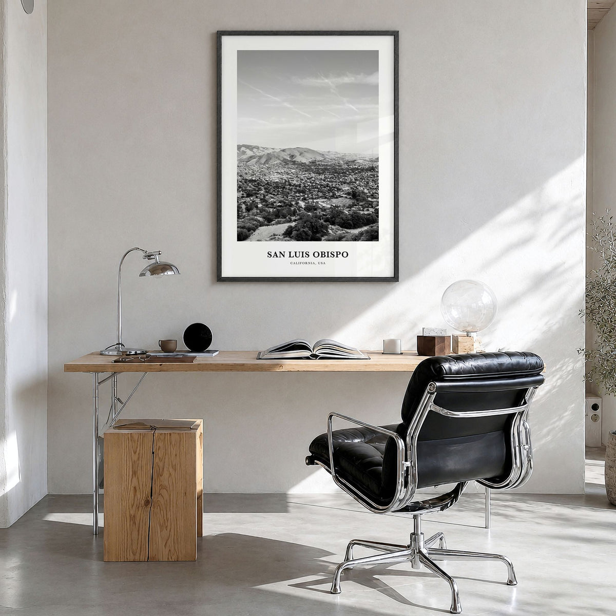 San Luis Obispo Classic Poster in a black wood frame, hanging in a bright home office