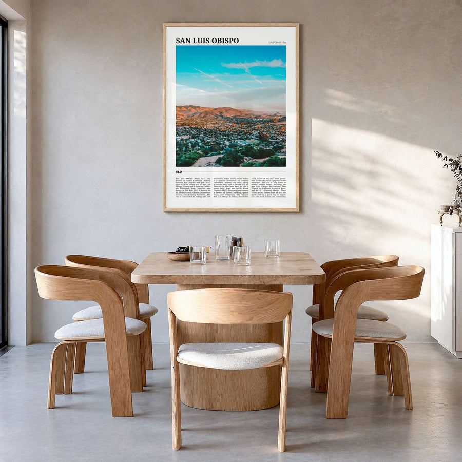 San Luis Obispo Travel No 2 Poster in a natural wood frame, hanging in a dining room