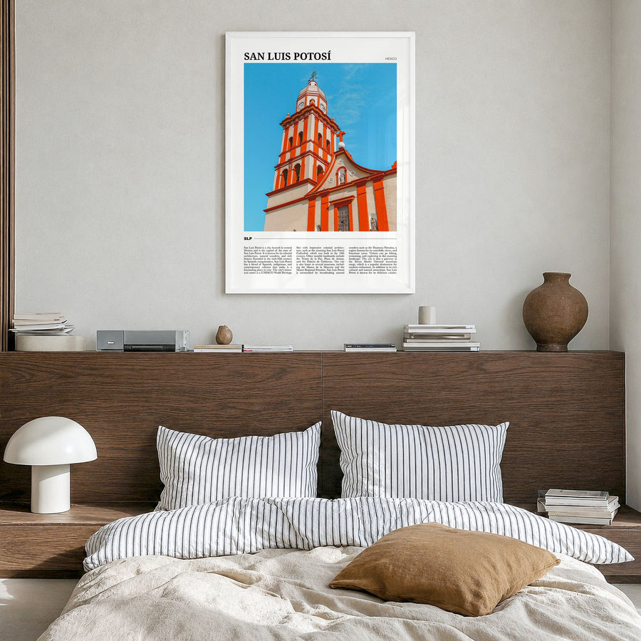 San Luis Potosí Travel Poster in a white wood frame, hanging in a bedroom
