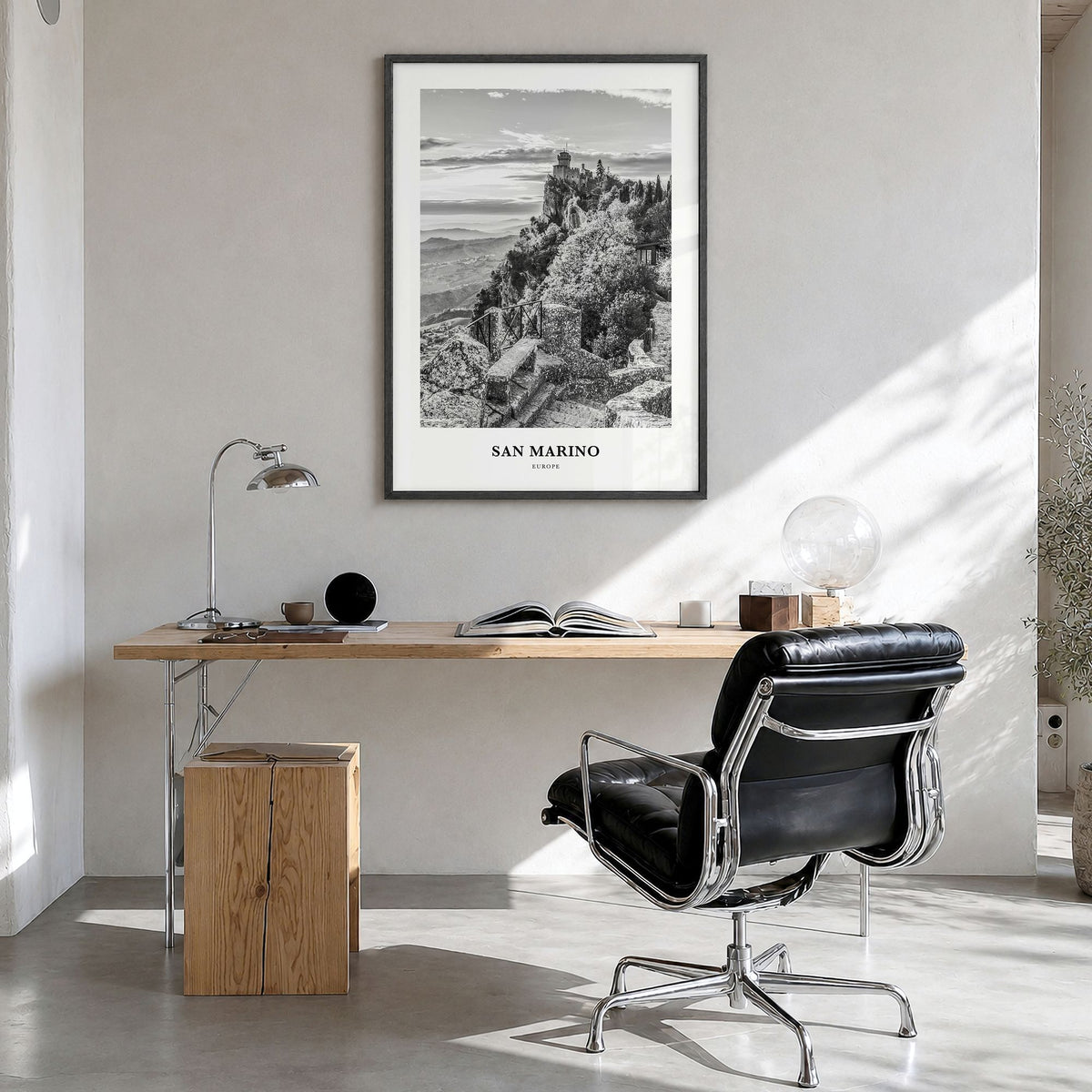 San Marino Classic Poster in a black wood frame, hanging in a bright home office