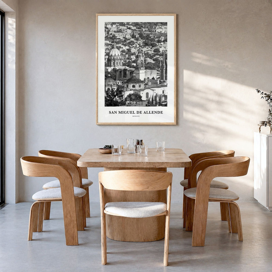 San Miguel de Allende Classic Poster in a natural wood frame, hanging in a dining room
