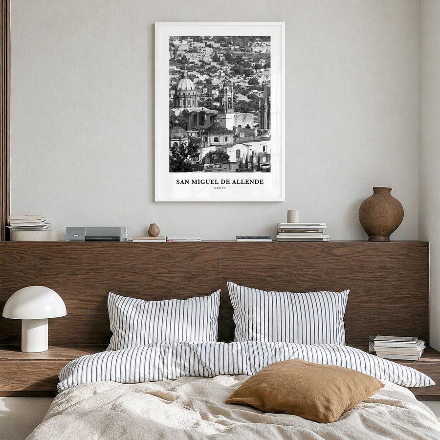San Miguel de Allende Classic Poster in a white wood frame, hanging in a bedroom