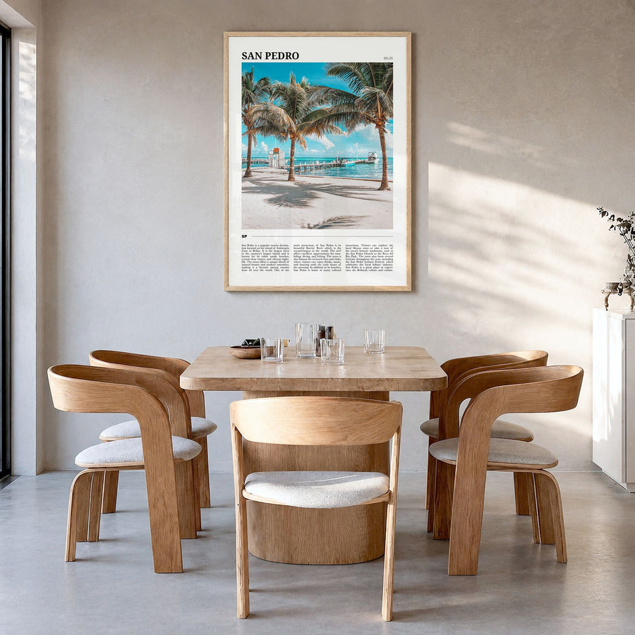 San Pedro, Belize Travel Poster in a natural wood frame, hanging in a dining room