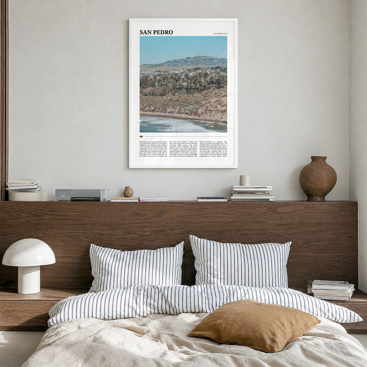 San Pedro, California Travel Poster in a white wood frame, hanging in a bedroom