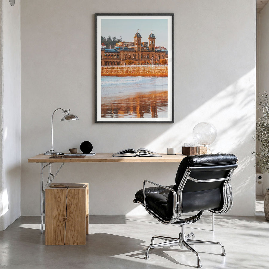 San Sebastián Photo No 2 Poster in a black wood frame, hanging in a bright home office, white border