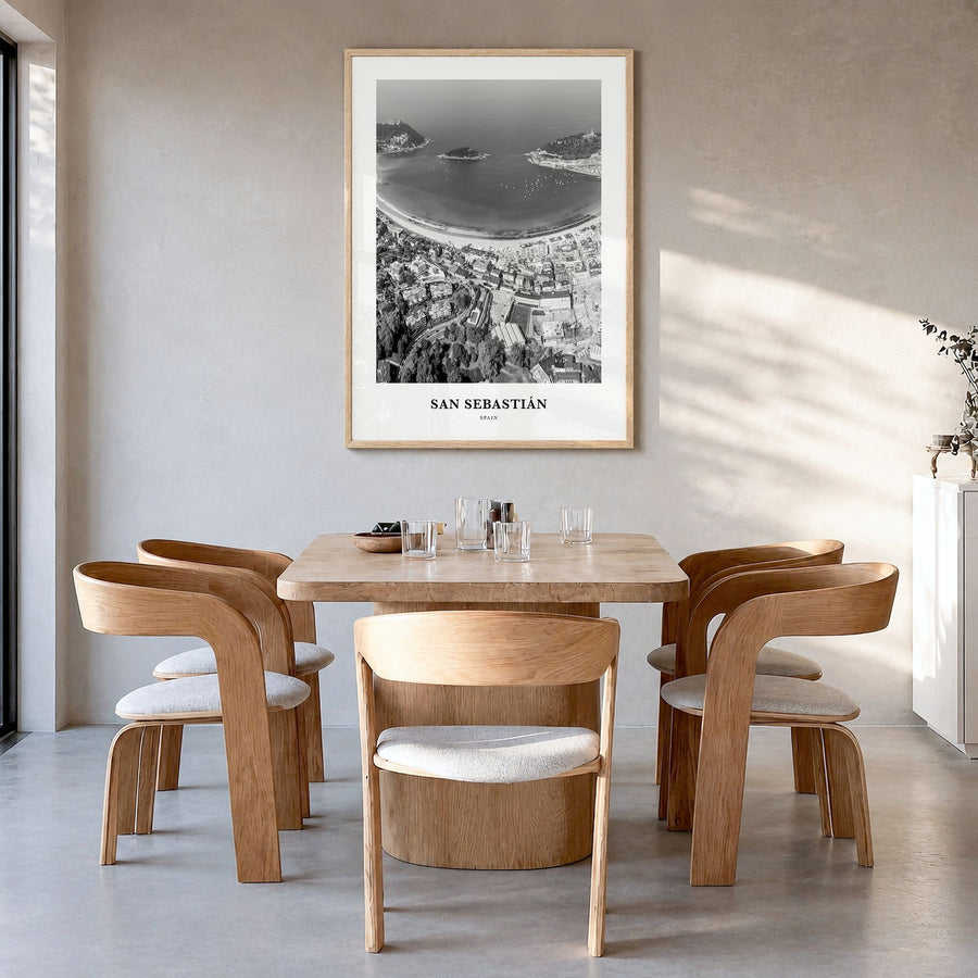 San Sebastián Classic No 2 Poster in a natural wood frame, hanging in a dining room