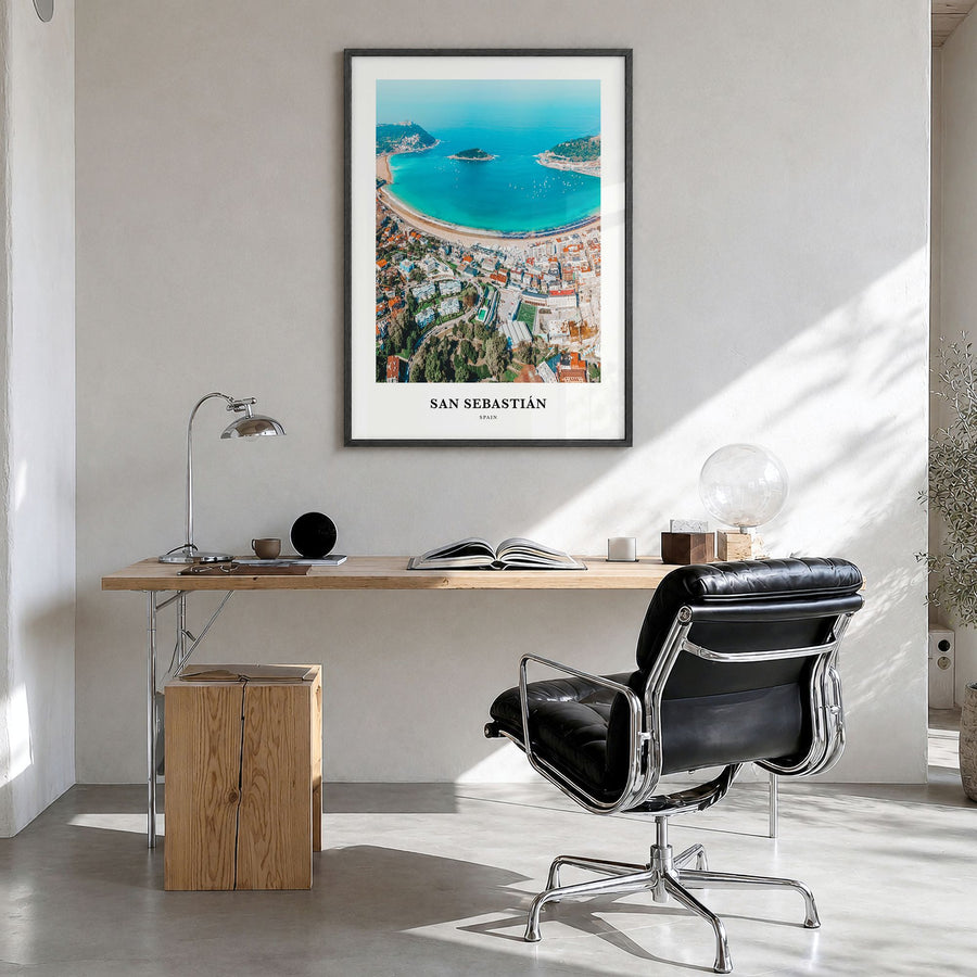 San Sebastián Classic Poster in a black wood frame, hanging in a bright home office