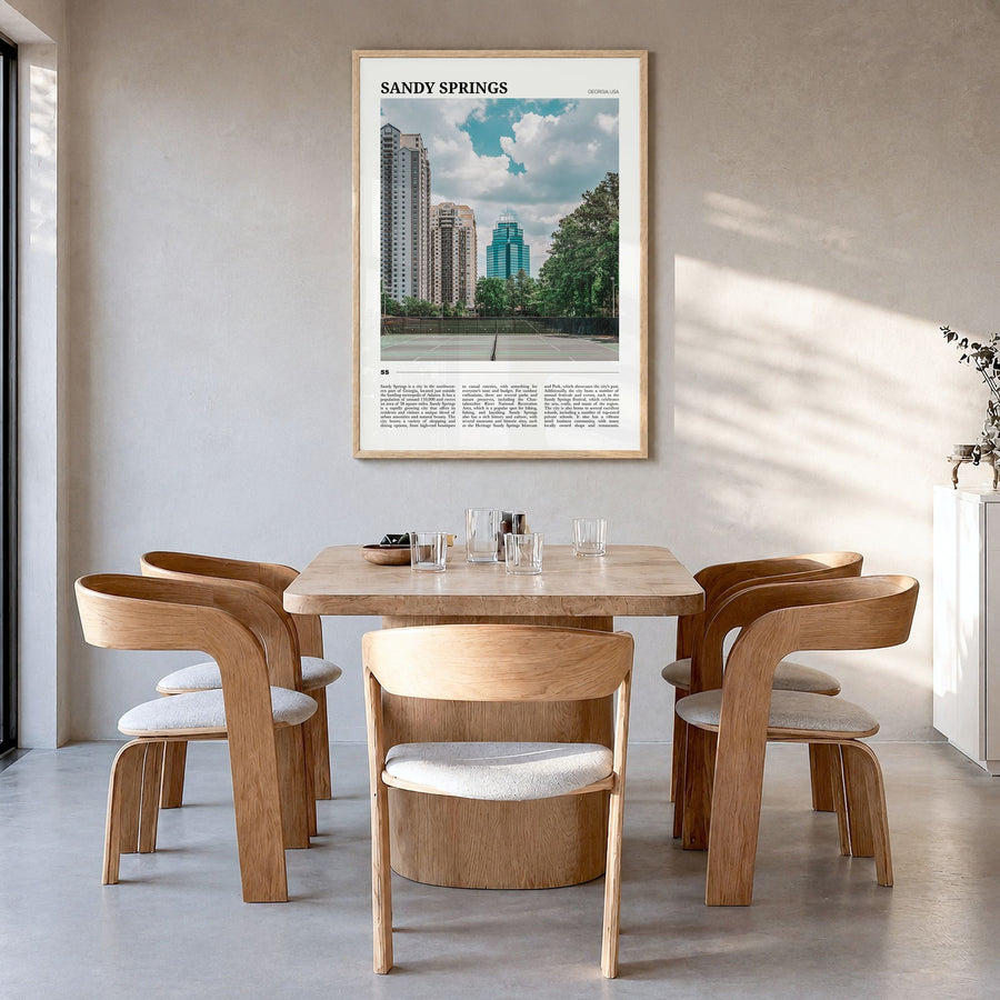 Sandy Springs Travel Poster in a natural wood frame, hanging in a dining room