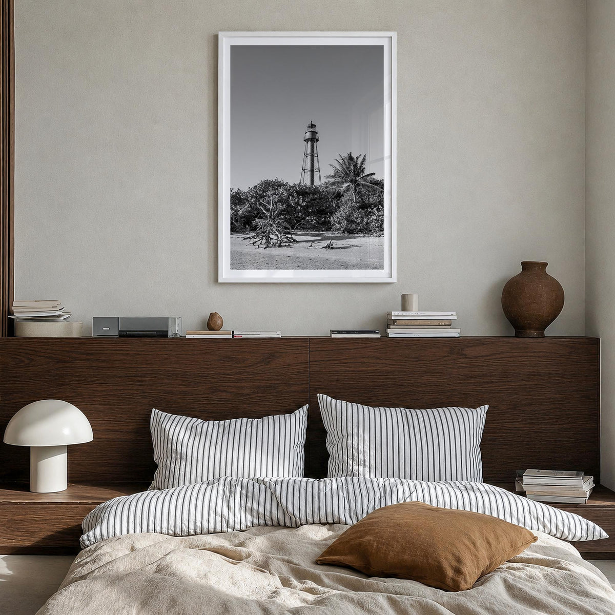 Sanibel black & white photo poster of Florida, USA – vertical wall art in white wood frame with white border, hanging on wall
