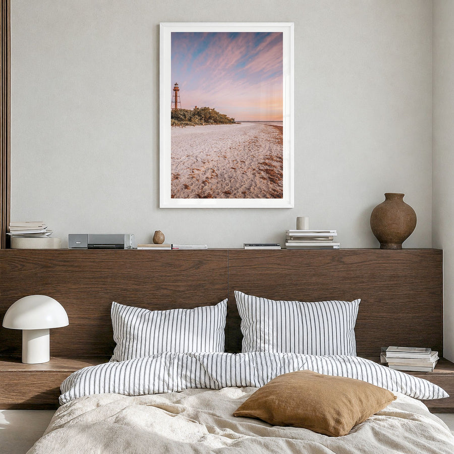 Sanibel Photo Poster in a white wood frame, hanging in a bedroom, white border